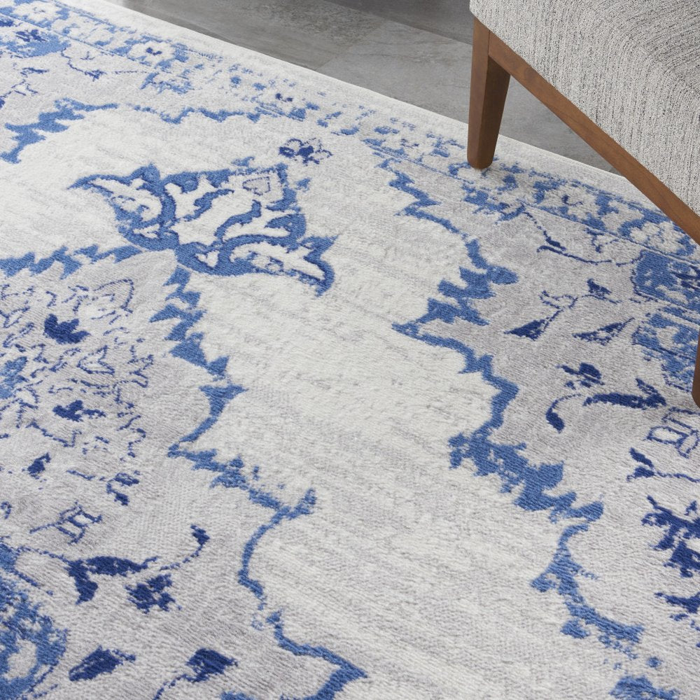 4' X 6' Ivory And Blue Geometric Area Rug