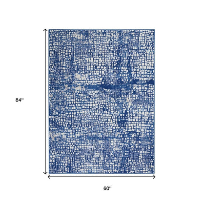 6' X 9' Ivory And Blue Geometric Area Rug