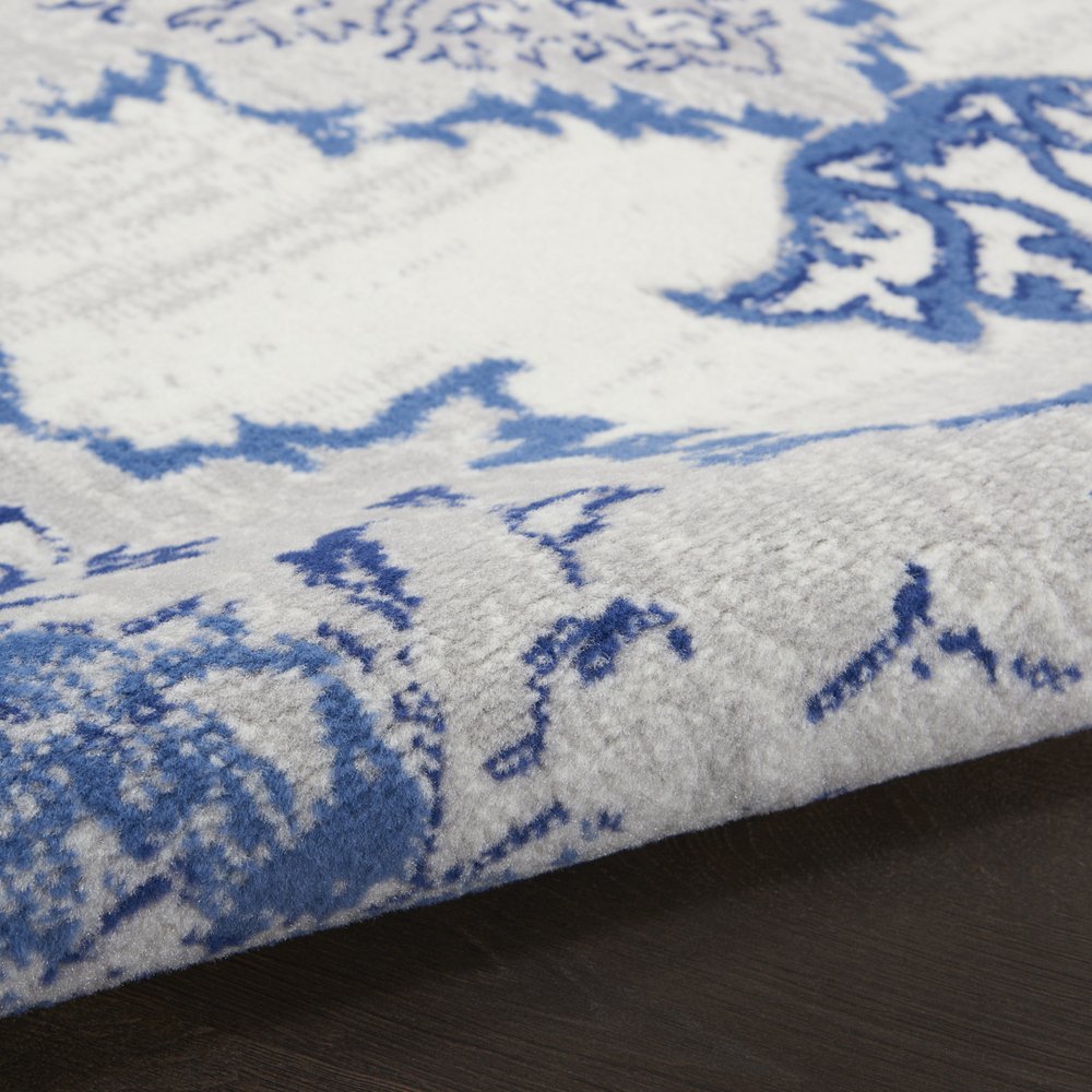 4' X 6' Ivory And Blue Geometric Area Rug