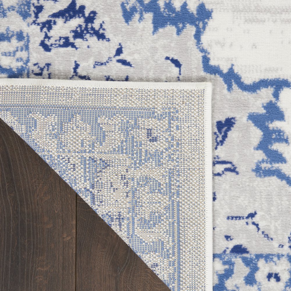 4' X 6' Ivory And Blue Geometric Area Rug