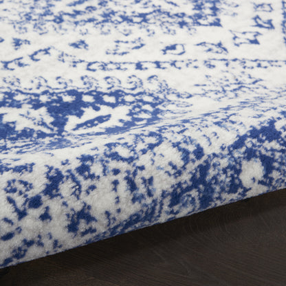 4' X 6' Ivory And Blue Geometric Area Rug