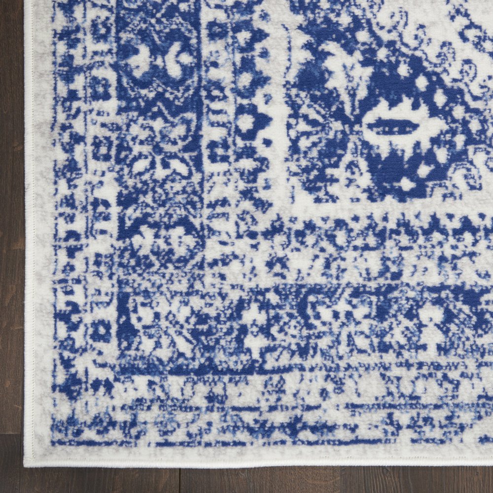 4' X 6' Ivory And Blue Geometric Area Rug