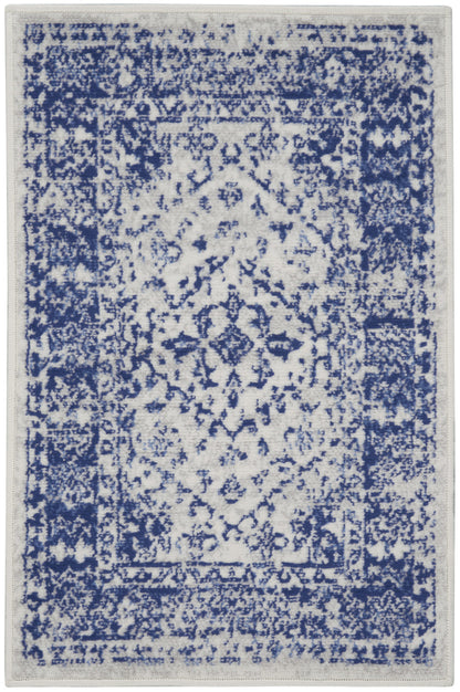 4' X 6' Ivory And Blue Geometric Area Rug