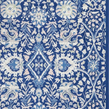 6' X 9' Blue And Ivory Floral Area Rug