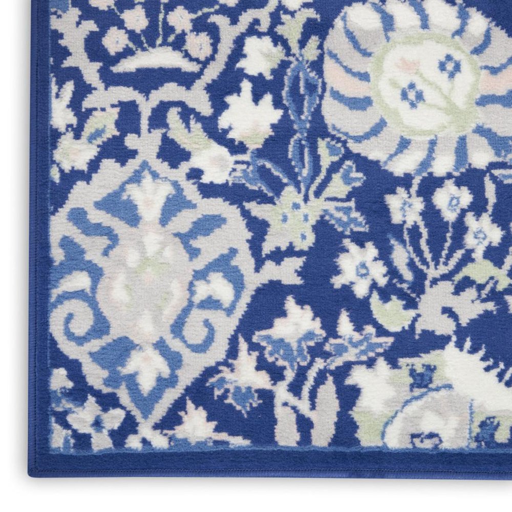 6' X 9' Blue And Ivory Floral Area Rug