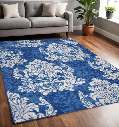 4' X 6' Ivory And Blue Damask Distressed Area Rug