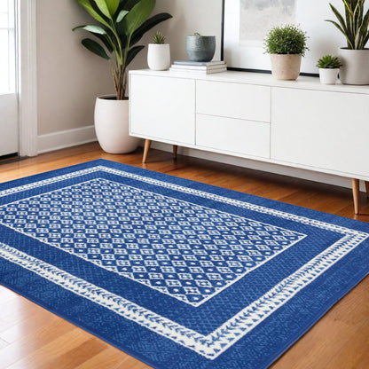 5' X 7' Blue And White Geometric Area Rug