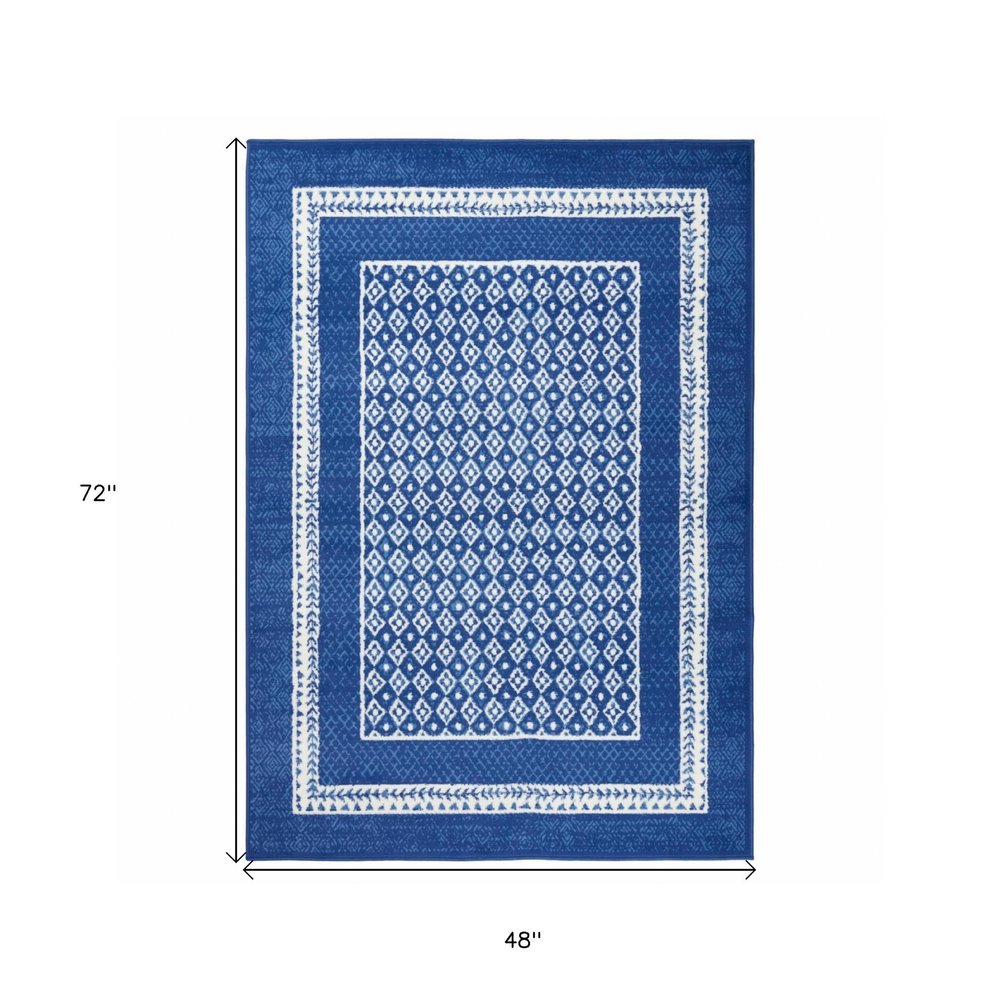 5' X 7' Blue And White Geometric Area Rug