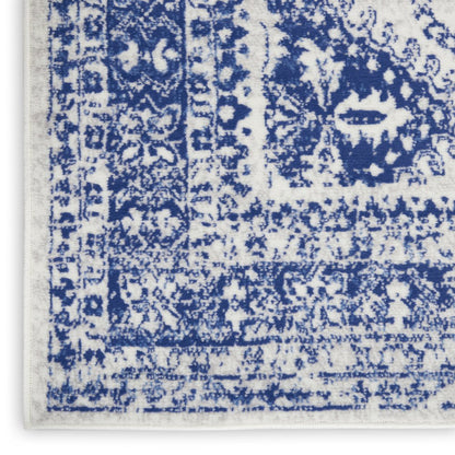4' X 6' Ivory And Blue Geometric Distressed Area Rug