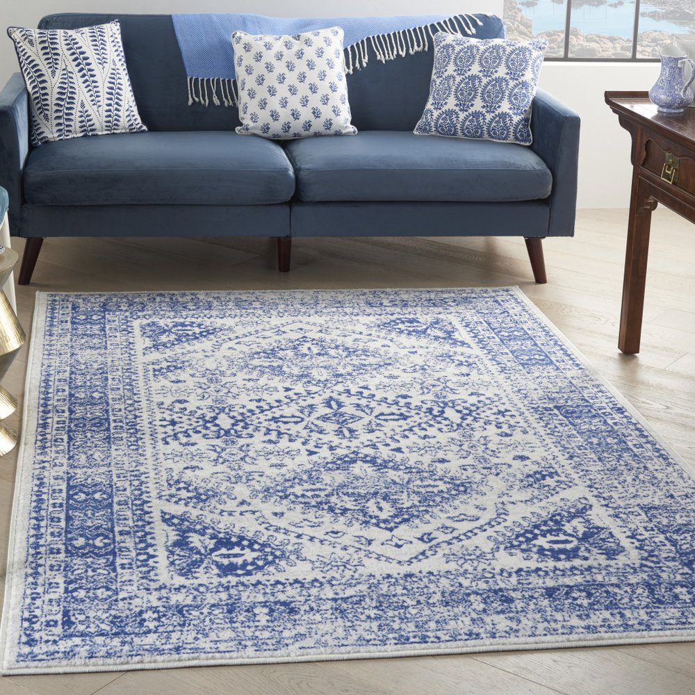 4' X 6' Ivory And Blue Geometric Distressed Area Rug