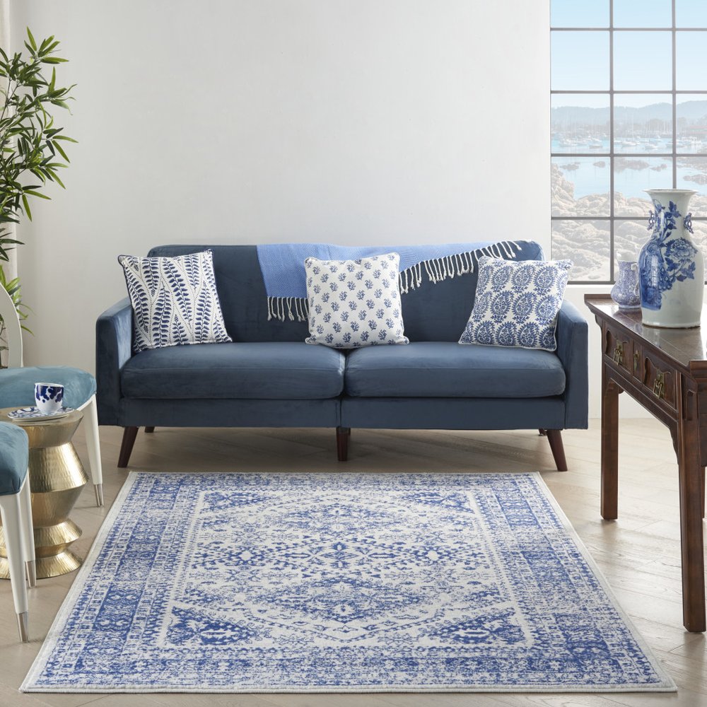 4' X 6' Ivory And Blue Geometric Distressed Area Rug