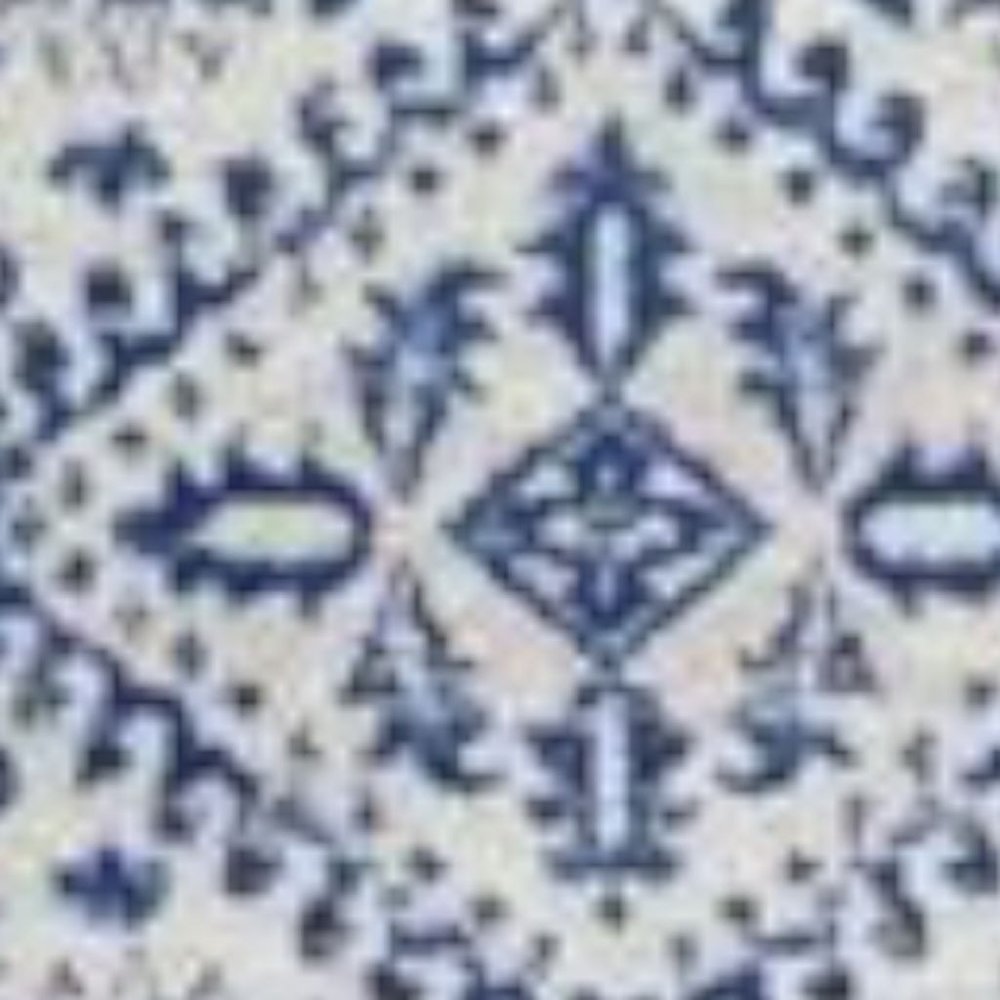 4' X 6' Ivory And Blue Geometric Distressed Area Rug