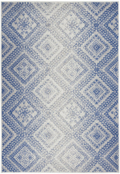 6' X 9' Ivory And Blue Geometric Area Rug