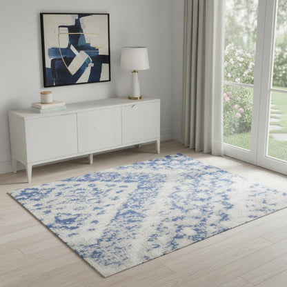 6' X 9' Ivory And Blue Geometric Area Rug