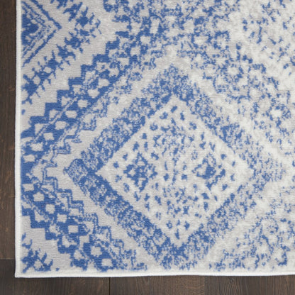6' X 9' Ivory And Blue Geometric Area Rug