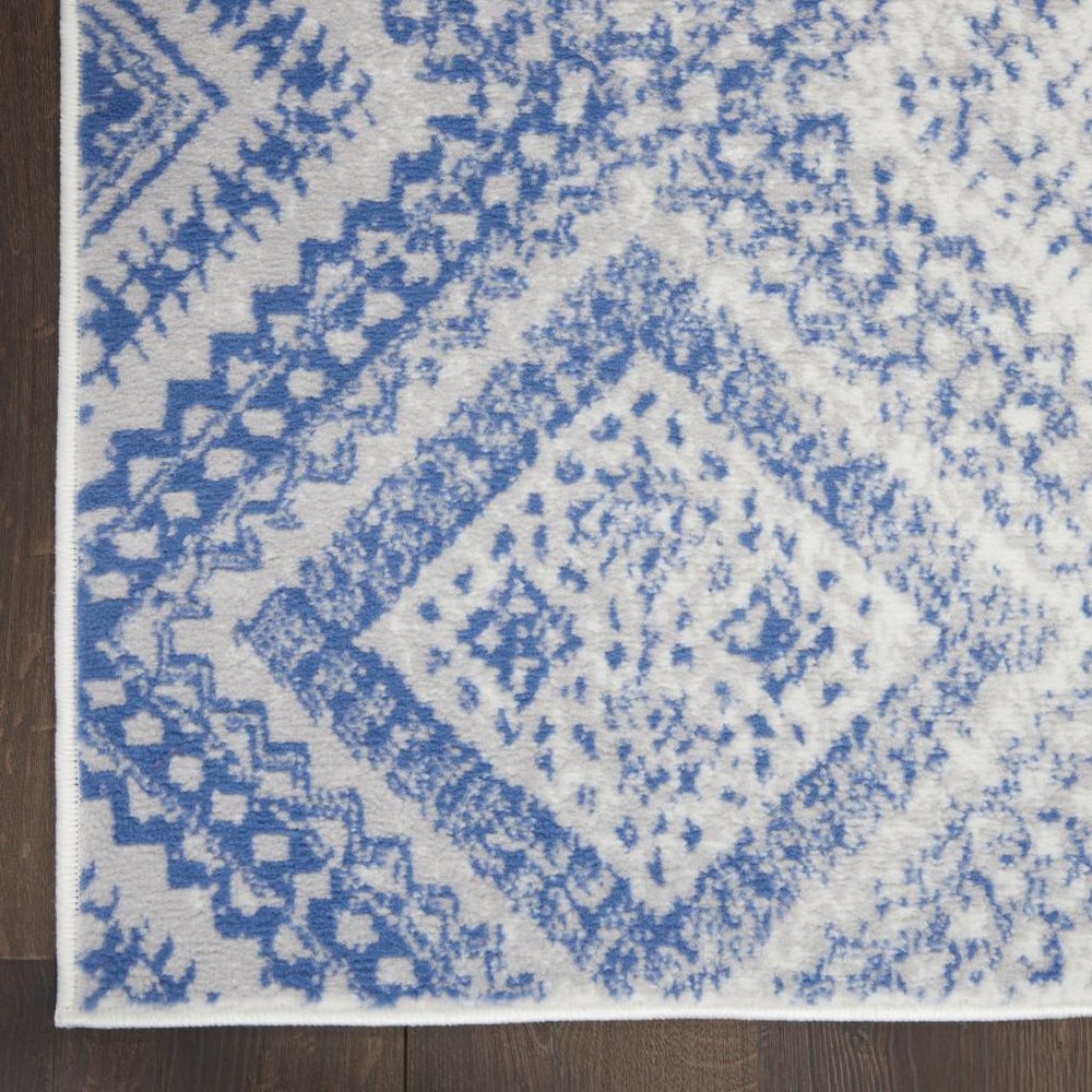 6' X 9' Ivory And Blue Geometric Area Rug