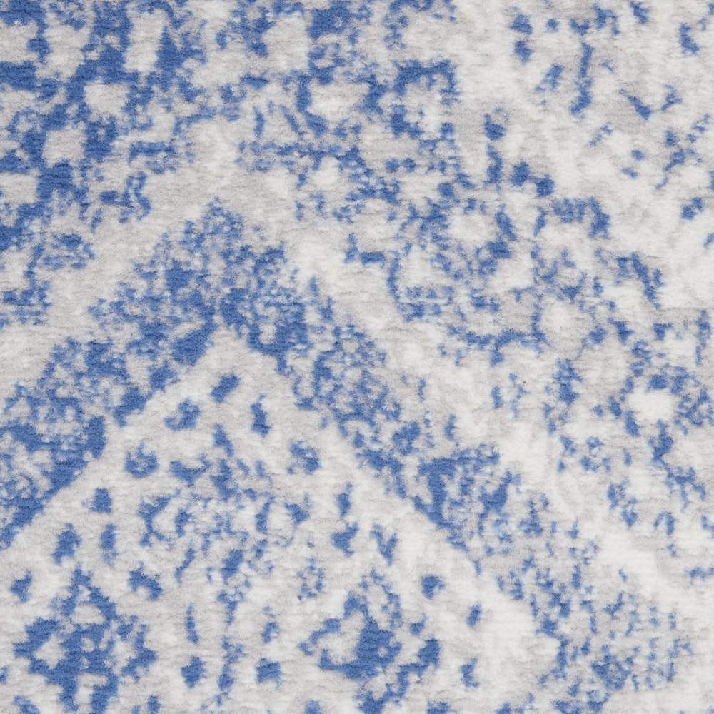 6' X 9' Ivory And Blue Geometric Area Rug