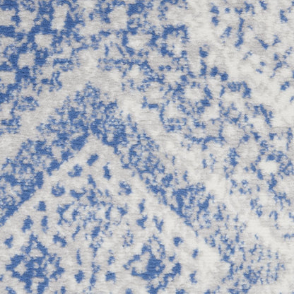 6' X 9' Ivory And Blue Geometric Area Rug