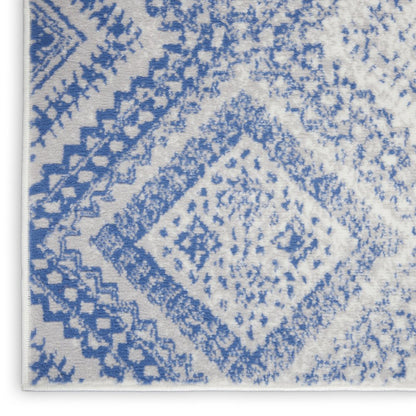 6' X 9' Ivory And Blue Geometric Area Rug