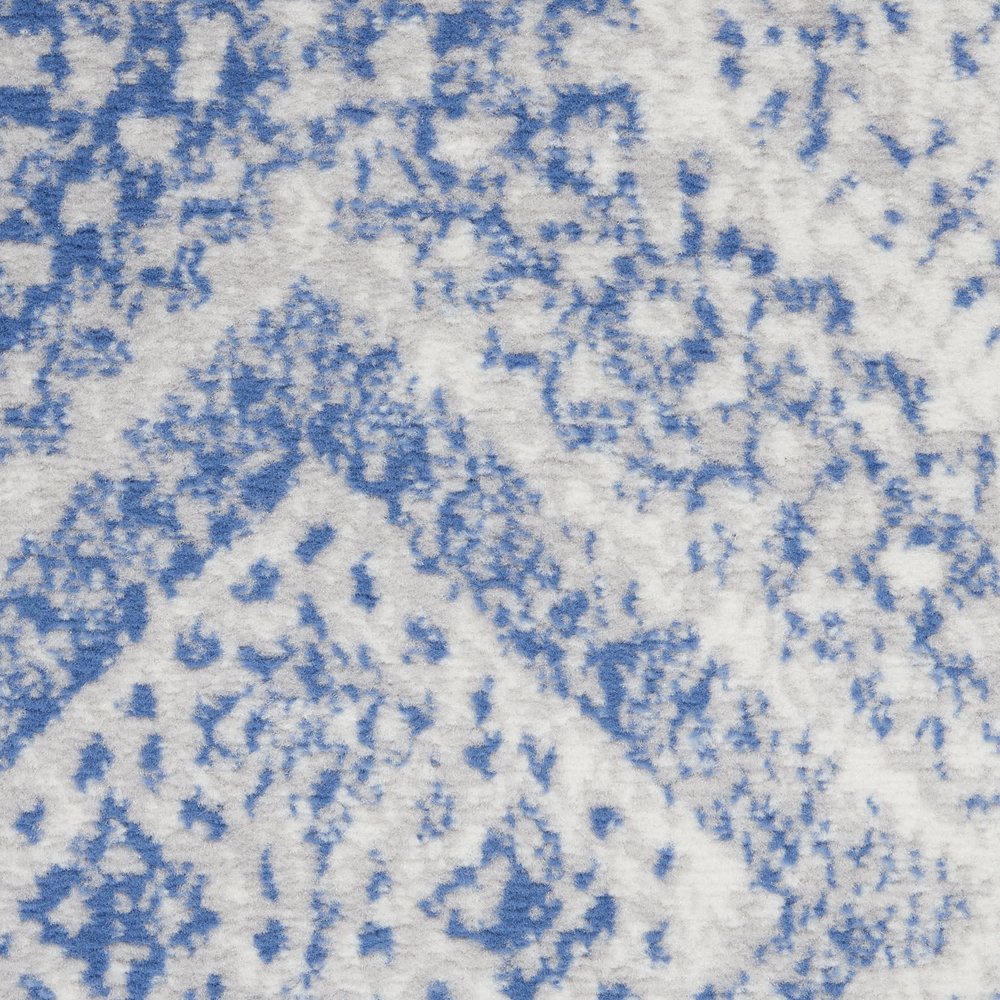 6' X 9' Ivory And Blue Geometric Area Rug