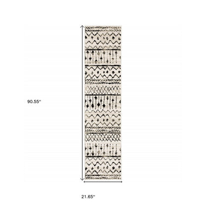 5' X 7' Ivory And Black Abstract Geometric Distressed Area Rug