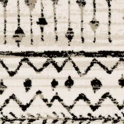 7' X 9' Ivory And Black Abstract Geometric Area Rug