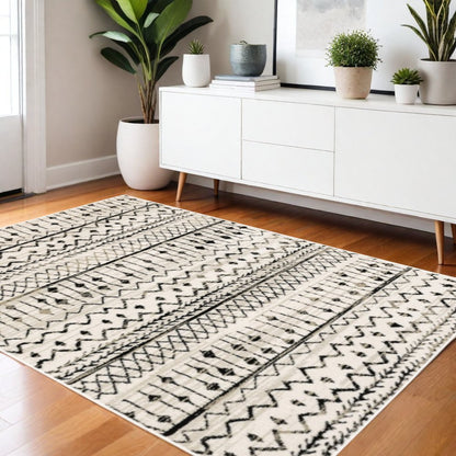 7' X 9' Ivory And Black Abstract Geometric Area Rug