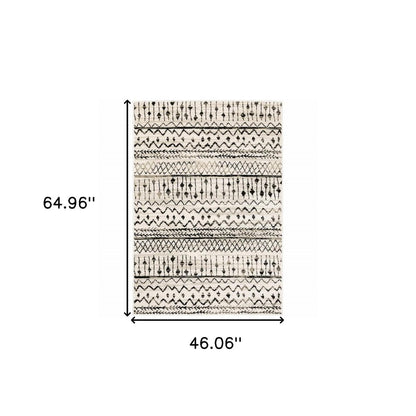 7' X 9' Ivory And Black Abstract Geometric Area Rug