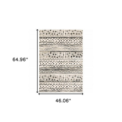 7' X 9' Ivory And Black Abstract Geometric Area Rug