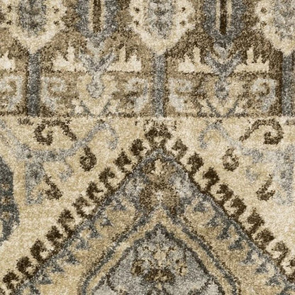5' X 8' Tan And Gold Medallion Distressed Area Rug