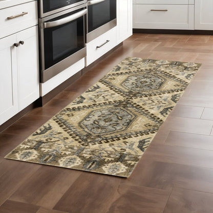 5' X 8' Tan And Gold Medallion Distressed Area Rug