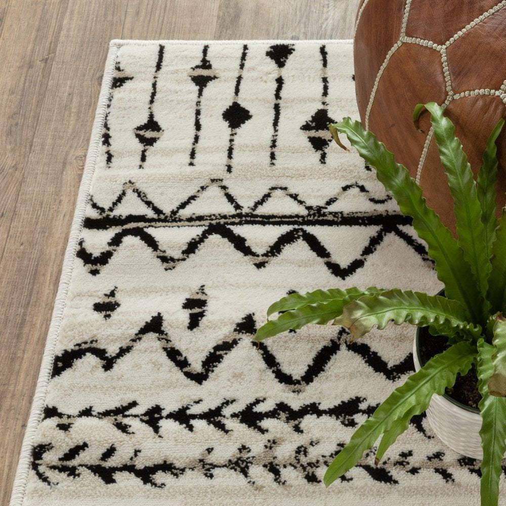 7' X 9' Ivory And Black Abstract Geometric Area Rug