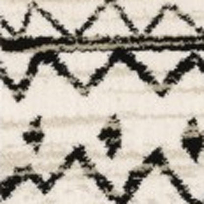 7' X 9' Ivory And Black Abstract Geometric Area Rug