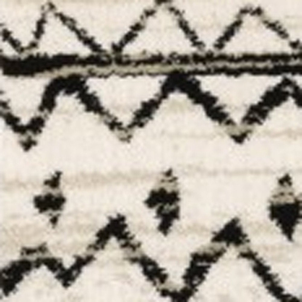 7' X 9' Ivory And Black Abstract Geometric Area Rug