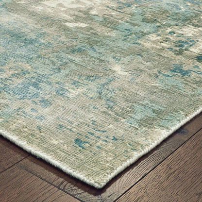 6' X 9' Blue And Gray Abstract Hand Loomed Distressed Area Rug