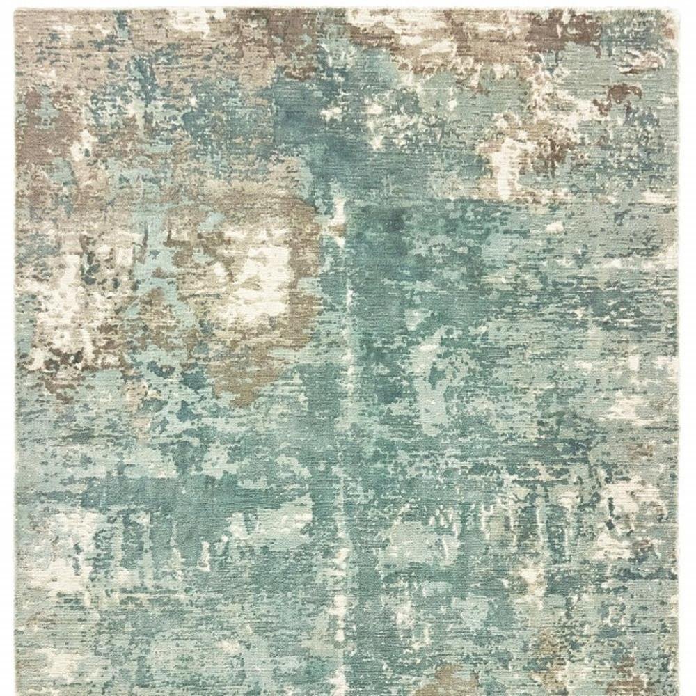 6' X 9' Blue And Gray Abstract Hand Loomed Distressed Area Rug