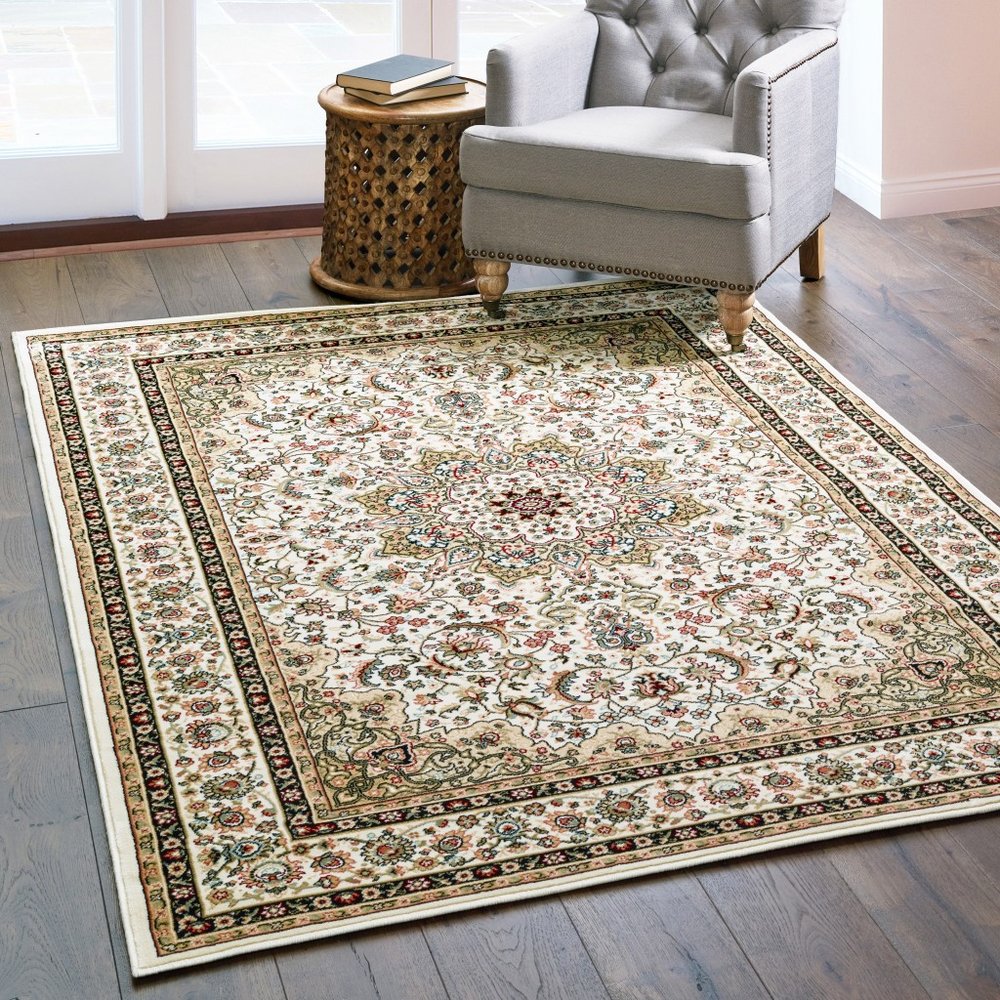 5' X 8' Ivory And Beige Floral Medallion Area Rug
