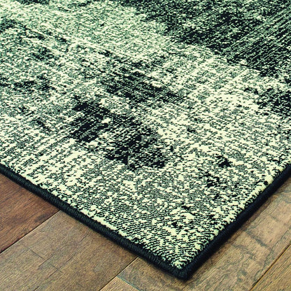 10' X 13' Black And Ivory Abstract Distressed Area Rug