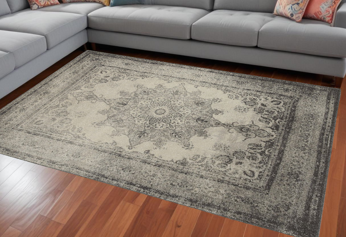 8' X 11' Ivory And Gray Pale Medallion Area Rug