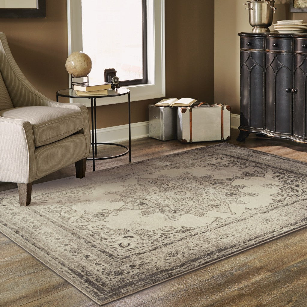 8' X 11' Ivory And Gray Pale Medallion Area Rug