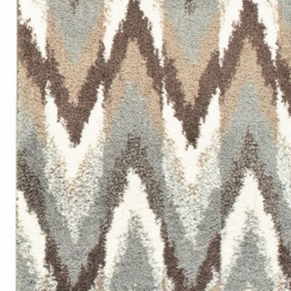 5' X 8' Gray And Taupe Ikat Pattern Area Rug