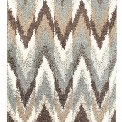 8' X 11' Gray And Taupe Ikat Pattern Area Rug
