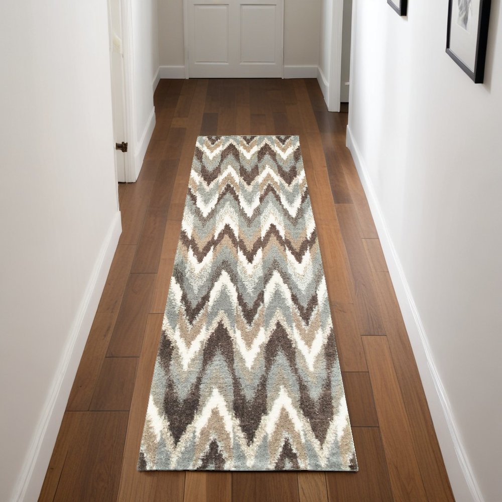 5' X 8' Gray And Taupe Ikat Pattern Area Rug