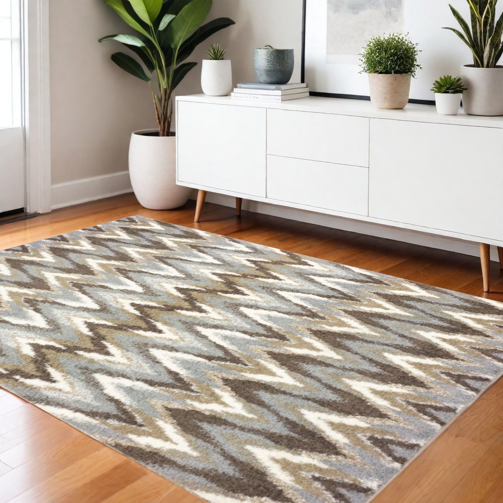 5' X 8' Gray And Taupe Ikat Pattern Area Rug