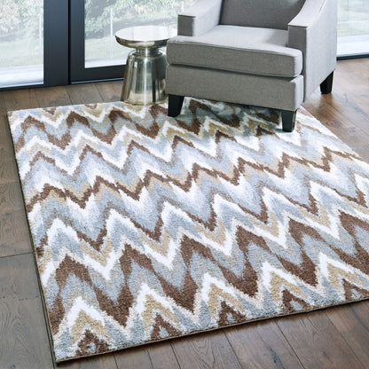5' X 8' Gray And Taupe Ikat Pattern Area Rug