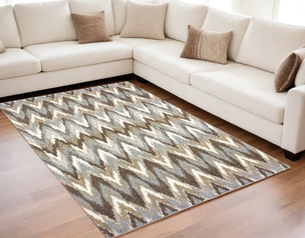 5' X 8' Gray And Taupe Ikat Pattern Area Rug