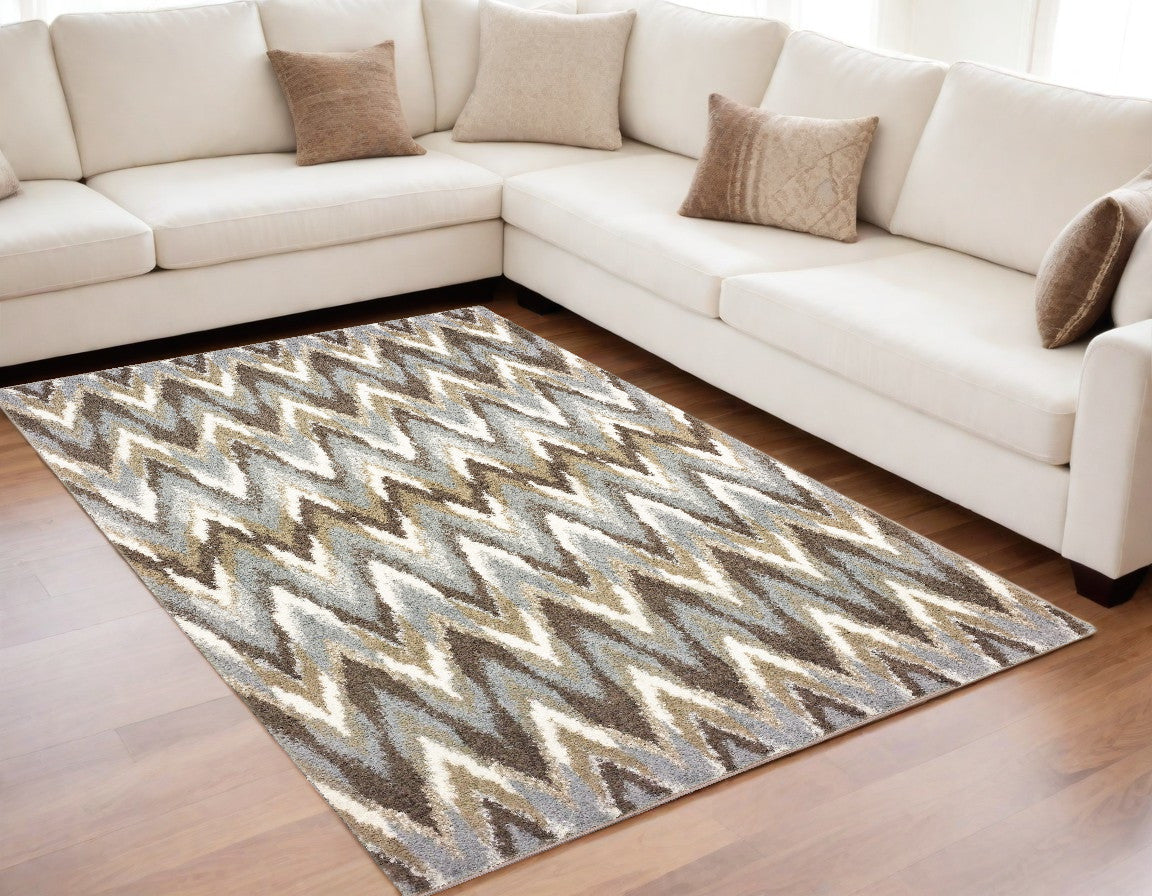 5' X 8' Gray And Taupe Ikat Pattern Area Rug
