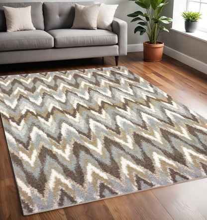 5' X 8' Gray And Taupe Ikat Pattern Area Rug