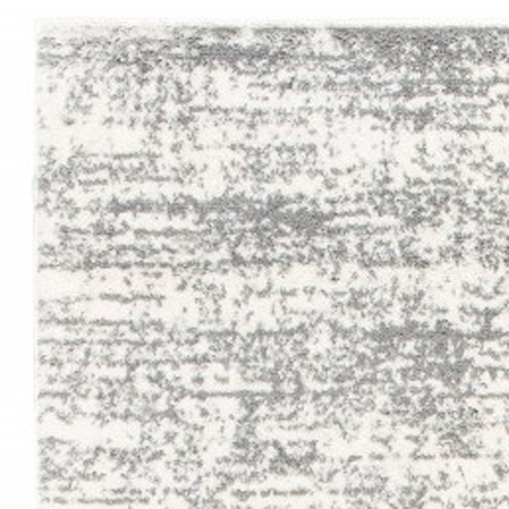 5' X 8' Ivory And Gray Abstract Strokes Area Rug