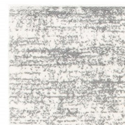 5' X 8' Ivory And Gray Abstract Strokes Area Rug